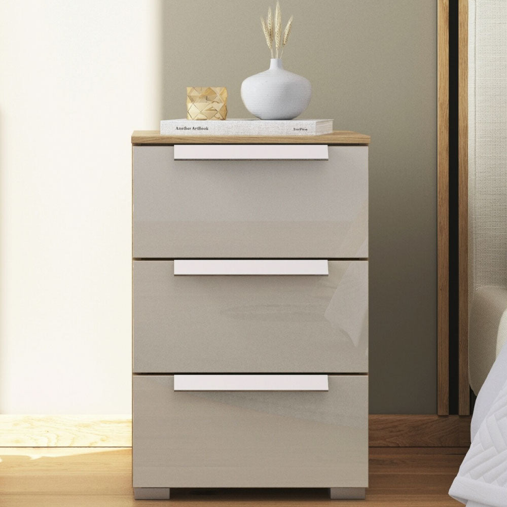 Rauch Aldono Deluxe 3 Drawer Bedside Table - Artisan Oak With Silk Grey Glass And Alpine White Handles
