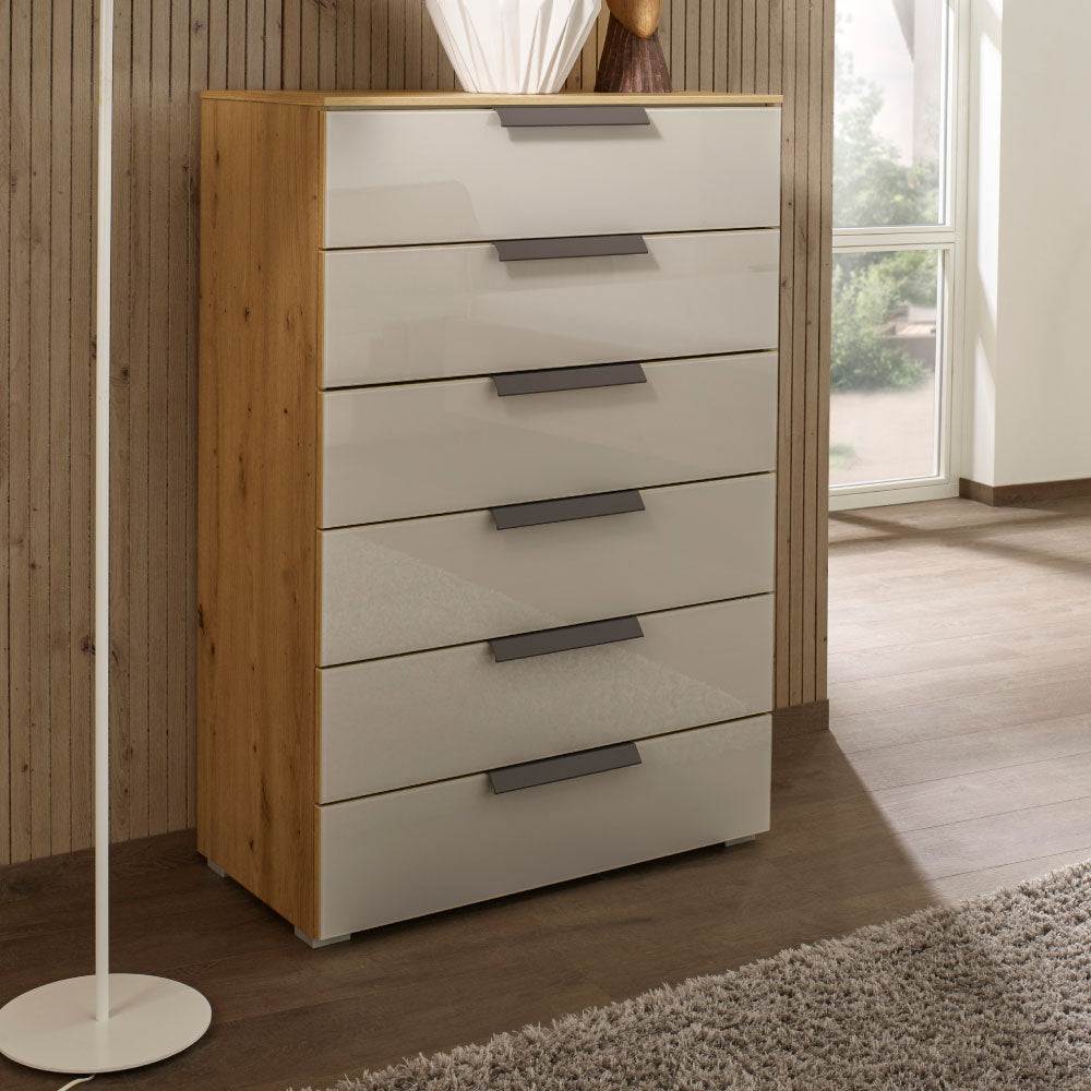 Rauch Aldono Deluxe 6 Drawer Chest - Sonoma Oak With Champagne Glass Fronts And Graphite Handles