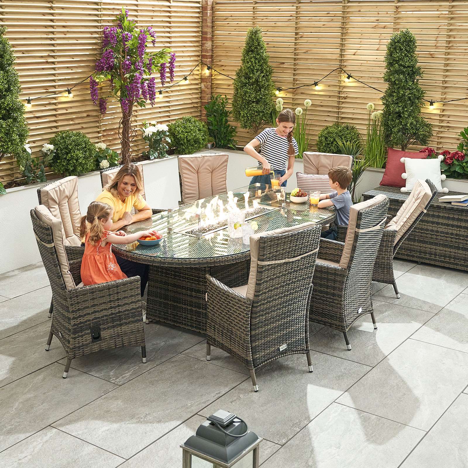 Nova Ruxley 8 Seat Dining Set with Fire Pit 2m x 1.2m Oval Table